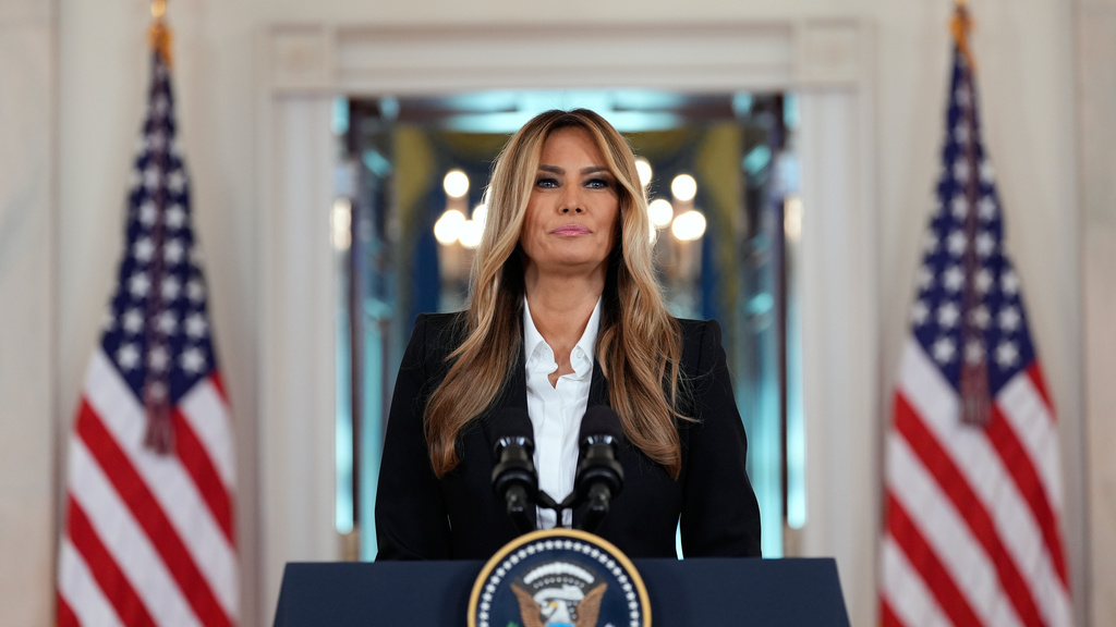 First lady Melania Trump speaks in the Grand Foyer of the White House, Friday, Oct. 10, 2025, in Washington. (AP Photo/Alex Brandon)