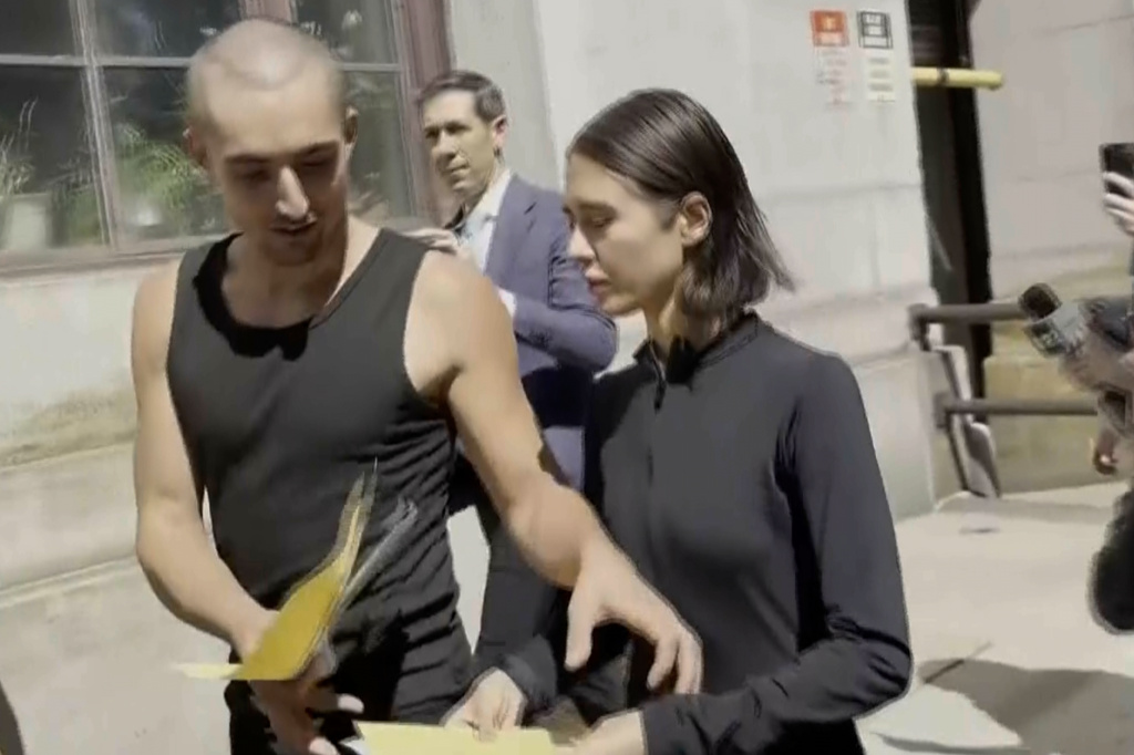 Angelina Nikolau and Ivan Kuznetsov, who go by Angela Nikolau and Ivan Beerkus, depart New York criminal courthouse building on Thursday, July 2, 2026. (AP Photo/Jennifer Peltz)