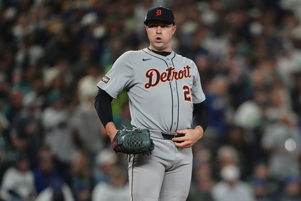 Detroit Tigers starting pitcher Tarik Skubal reacts after giving up a single to Seattle Mariners designated hitter Mitch Garver during the seventh inning in Game 2 of baseball's American League Division Series, Sunday, Oct. 5, 2025, in Seattle. (AP Photo/Lindsey Wasson)