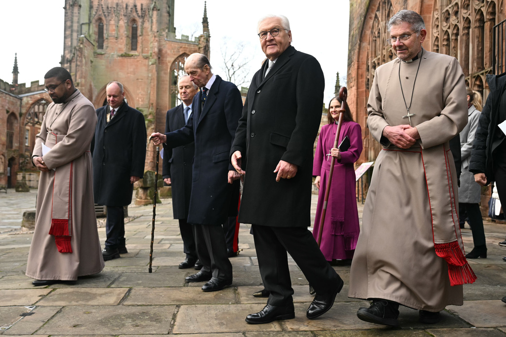 Britain's Duke of Kent, third right, and Germany's President Frank-Walter Steinmeier, second right, tour the ruins of the old Cathedral in Coventry, Coventry Cathedral, in Coventry, England, Friday, Dec. 5, 2025, on the final day of the state visit to the UK. (Oli Scarff/Pool Photo via AP)