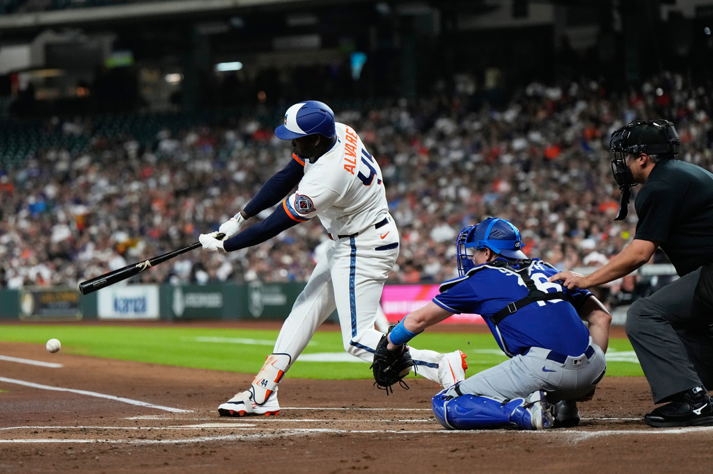 Houston Astros designated hitter Yordan Alvarez (44) singles during the first inning of a baseball game against the Los Angeles Dodgers in Houston, Monday, May 4, 2026. (AP Photo/Ashley Landis)