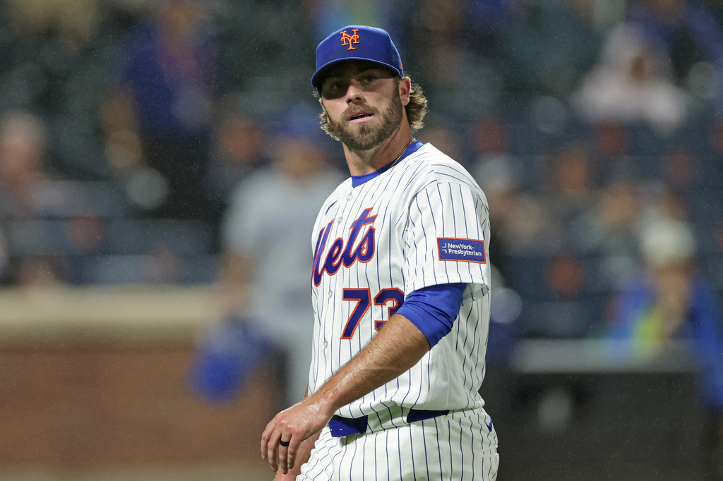 New York Mets pitcher Matt Seelinger reacts walking off the field during the seventh inning of a baseball game against the Kansas City Royals, Tuesday, July 7, 2026, in New York. (AP Photo/Adam Hunger)