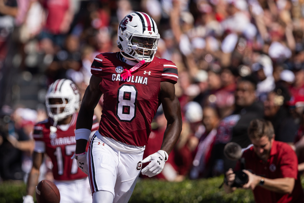 South Carolina wide receiver Nyck Harbor (8) celebrates a touchdown during the first half against Oklahoma in an NCAA college football game, Saturday, Oct. 18, 2025, in Columbia, S.C. (AP Photo/Scott Kinser)