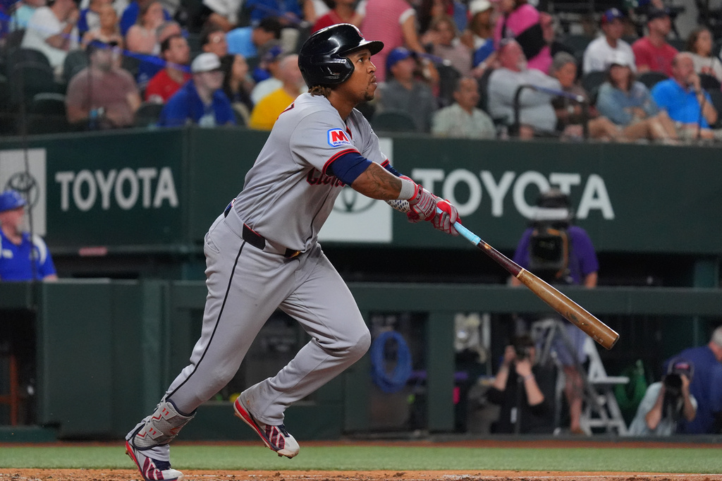 Cleveland Guardians' José Ramírez watches his home run sail into center field during the fourth inning of a baseball game against the Texas Rangers, Saturday, June 6, 2026, in Arlington, Texas. (AP Photo/LM Otero)