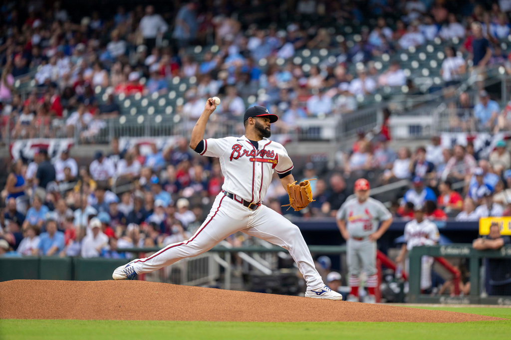 Atlanta Braves Reynaldo López (40) throws out the first pitch of the game during first inning of a baseball game against the St. Louis Cardinals Wednesday, July 1, 2026, in Atlanta. (AP Photo/Erik Rank)