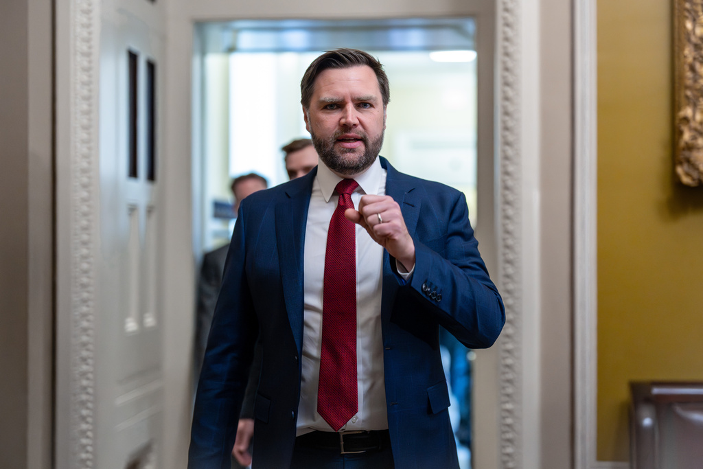 Vice President JD Vance arrives to speak with reporters after emerging from a closed-door meeting with Senate Republicans at the Capitol in Washington, Tuesday, Oct. 28, 2025. (AP Photo/J. Scott Applewhite)