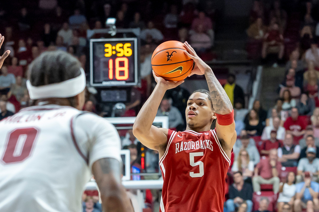 Arkansas guard Darius Acuff Jr. (5) shoots during the first half of an NCAA college basketball game against Alabama Wednesday, Feb. 18, 2026, in Tuscaloosa, Ala. (AP Photo/Vasha Hunt)