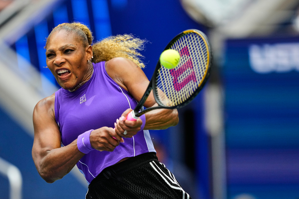 Serena Williams, of the United States, returns the ball during a mixed doubles match at the U.S. Open tennis championships, Tuesday, Aug. 25, 2026, in New York. (AP Photo/Yuki Iwamura)