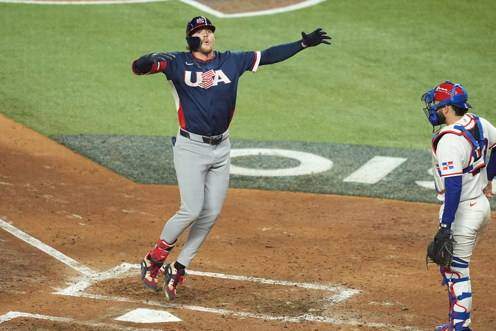 United States' Gunnar Henderson celebrates after hitting a home run during the fourth inning of a World Baseball Classic semifinal game against the Dominican Republic, Sunday, March 15, 2026, in Miami. (AP Photo/Rebecca Blackwell)