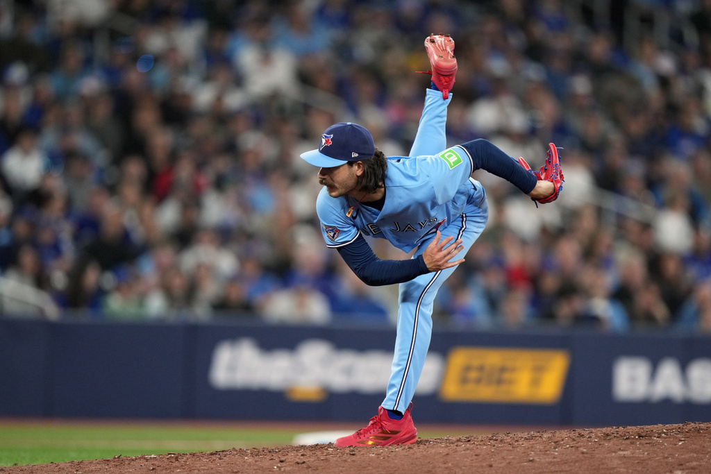 Toronto Blue Jays pitcher Dylan Cease (84) pitches during sixth inning of a baseball game against the Los Angeles Dodgers in Toronto, Wednesday, April 8, 2026. (Nathan Denette/The Canadian Press via AP)