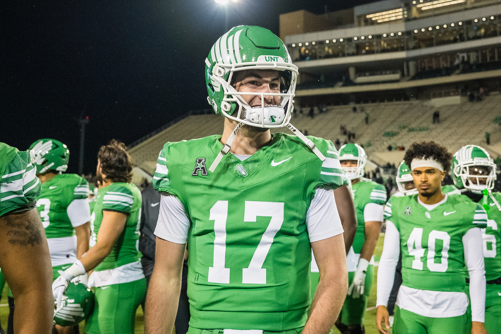 North Texas' Drew Mestemaker (17) celebrates after winning an NCAA college football game against Temple, Friday, Nov. 28, 2025, Denton, Texas. (AP Photo/Jessica Tobias)