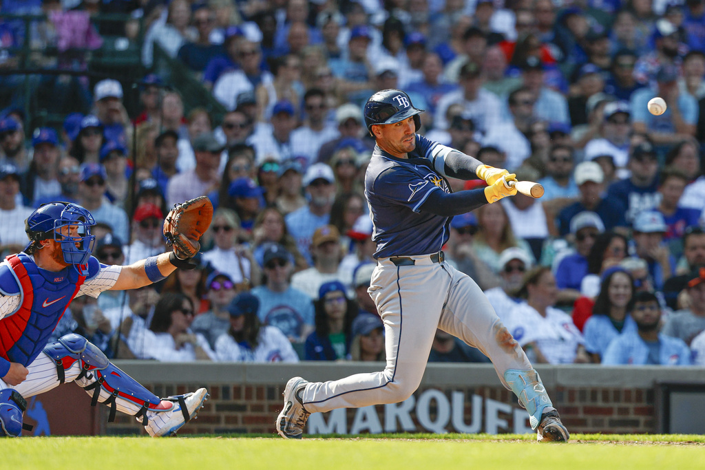 Tampa Bay Rays pinch hiter Nick Fortes hits a solo home run against the Chicago Cubs during the ninth inning of a baseball game Saturday, Sept. 13, 2025, in Chicago. (AP Photo/Kamil Krzaczynski)
