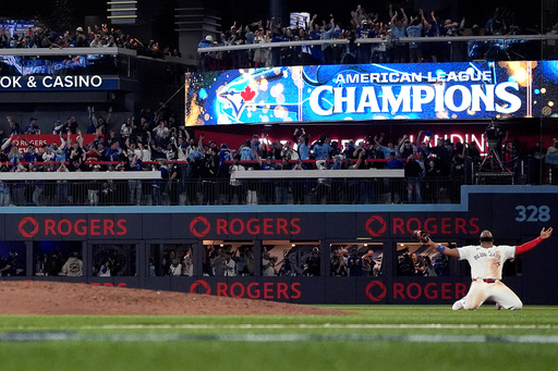 Toronto Blue Jays' Vladimir Guerrero Jr. celebrates after the final out of Game 7 of baseball's American League Championship Series, Monday, Oct. 20, 2025, in Toronto. (Nathan Denette/The Canadian Press via AP) Toronto Blue Jays' Vladimir Guerrero Jr. celebrates after the final out of Game 7 of baseball's American League Championship Series, Monday, Oct. 20, 2025, in Toronto. (Nathan Denette/The Canadian Press via AP)
