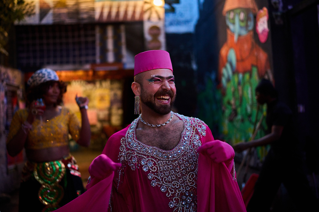 Haidar Darwish, a Syrian belly dancer with the Berlin-based LGBTQ collective Queens Against Borders, performs during an open-air show in Berlin, Germany, Friday, July 17, 2026. (AP Photo/Ebrahim Noroozi)