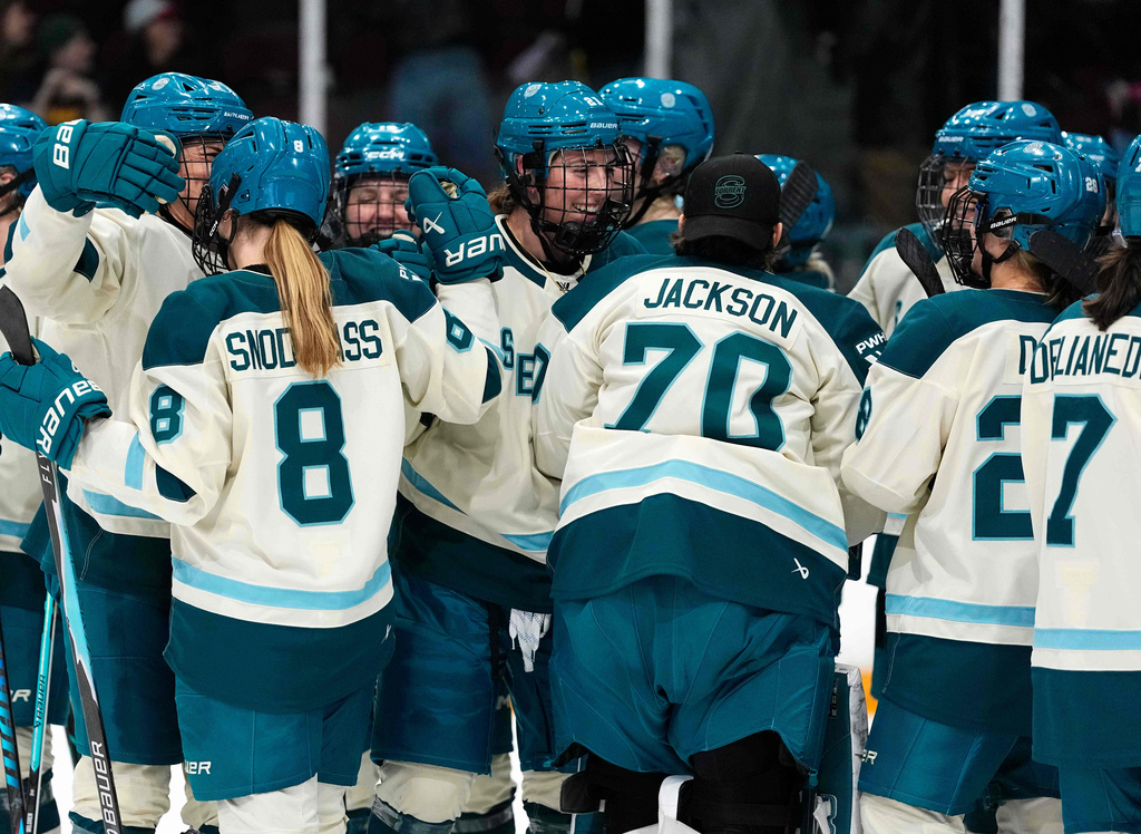 Seattle Torrent's Hilary Knight (centre) celebrates the team's win against the Ottawa Charge after third period PWHL hockey action in Ottawa, on Wednesday, April 8, 2026. (Justin Tang/The Canadian Press via AP)