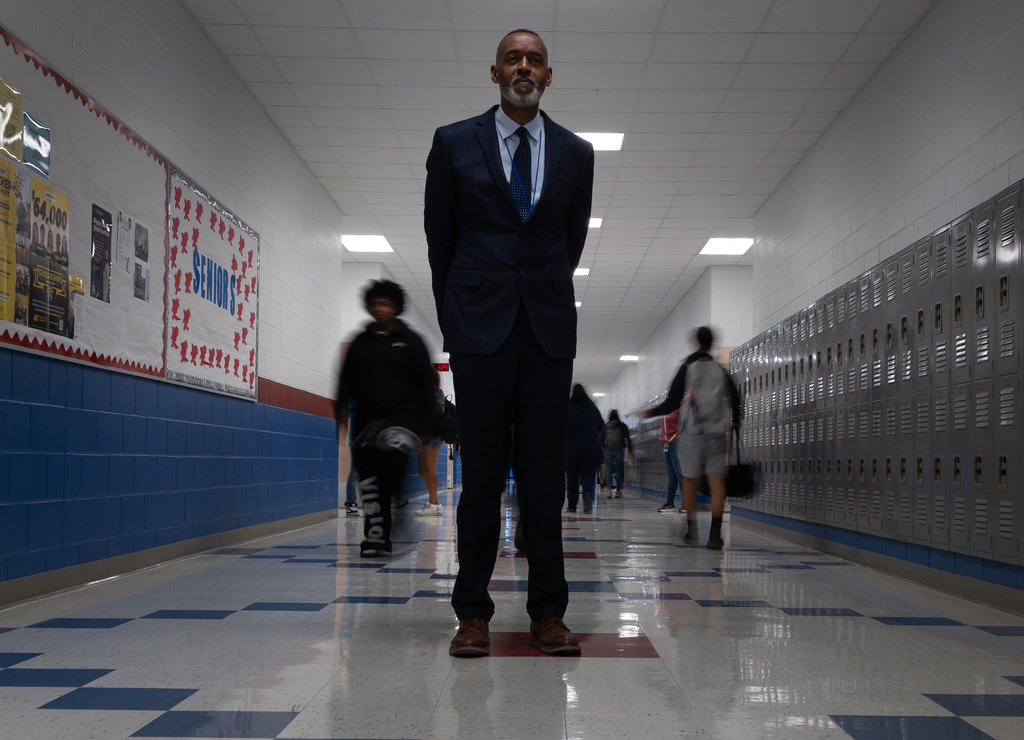 Lackland Independent School District Superintendent Dr. Burnie Roper stands in a hallway at the Virginia Allred Stacey Jr./Sr. High School Monday, Nov. 3, 2025, in San Antonio. (AP Photo/Kin Man Hui)