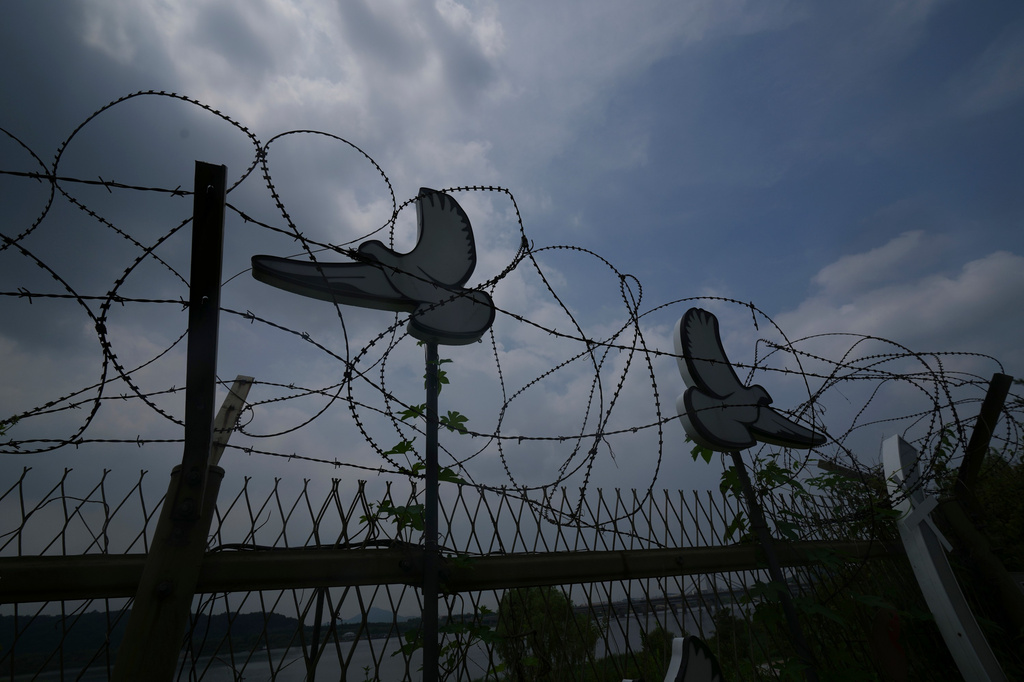 A symbolic structure remains to commemorate the removal of the military barbed-wire fence in Goyang, South Korea, Friday, July 3, 2026. (AP Photo/Lee Jin-man)