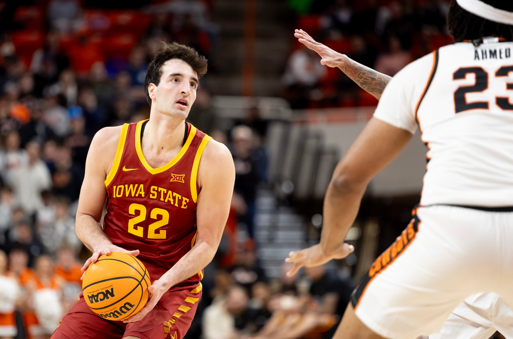 Iowa State forward Milan Momcilovic (22) shoots the ball in the first half of the NCAA college basketball game against Oklahoma State, Saturday, Jan. 24, 2026 in Stillwater, Okla. (AP Photo/Mitch Alcala)