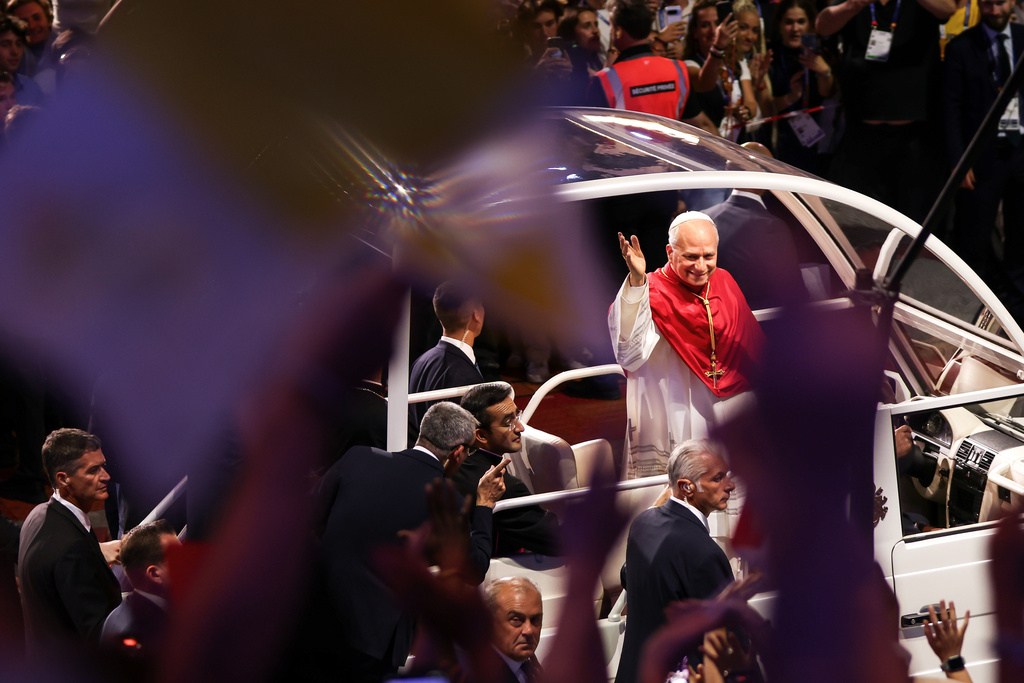 Pope Leo XIV arrives on the popemobile at the Stade de France in Saint-Denis near Paris to preside over Vespers with young people, Friday, Sept. 25, 2026. (AP Photo/Thomas Padilla)