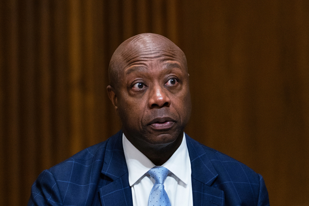 Sen. Tim Scott, R-S.C., asks questions following Treasury Secretary Scott Bessent's testimony before the Senate Committee on Finance hearing to examine the President's proposed budget request for fiscal year 2027, Wednesday, June 3, 2026 in Washington. (AP Photo/Allison Robbert)