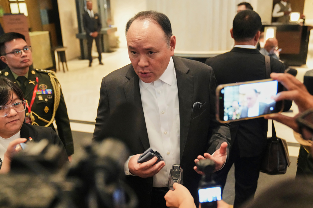 FILE - Philippine's Defense Secretary Gilberto Teodoro talks to the media as he attends the Shangri-La Dialogue, Asia's annual defense and security forum, in Singapore on May 29, 2026. (AP Photo/Achmad Ibrahim, File)