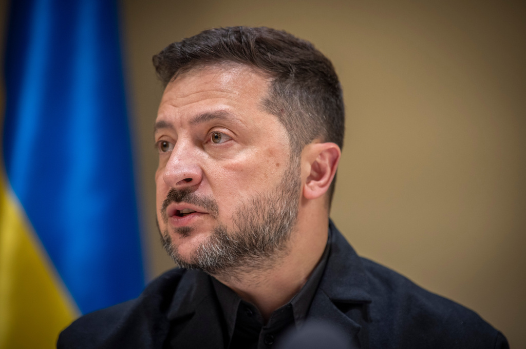 Ukrainian President Volodymyr Zelenskyy speaks to the media after a German-Ukrainian business forum in Kyiv, Ukraine, Sunday, Oct. 4, 2026. (AP Photo/Dan Bashakov)