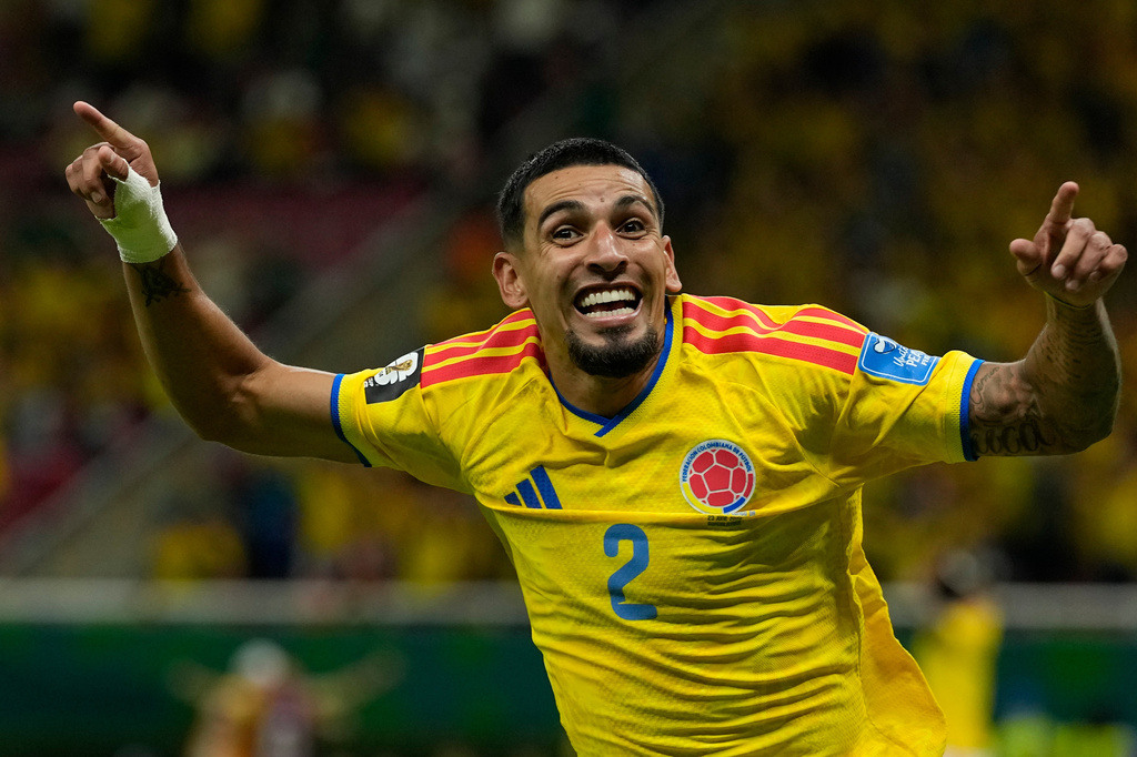 Colombia's Daniel Munoz celebrates after scoring his side's opening goal during the World Cup Group K soccer match between Colombia and Congo in Zapopan, near Guadalajara, Mexico, Tuesday, June 23, 2026. (AP Photo/Ricardo Mazalan)