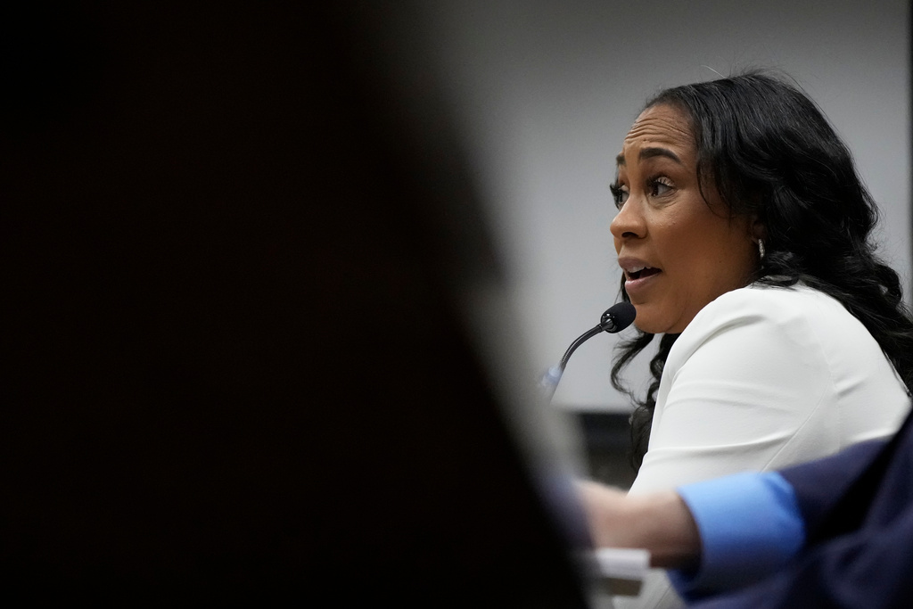 Fulton County District Attorney Fani Willis is seen at the Georgia State Capitol during questioning from a Georgia State Senate panel about her prosecution of President Donald Trump on Wednesday, Dec. 17, 2025, in Atlanta. (AP Photo/Brynn Anderson)
