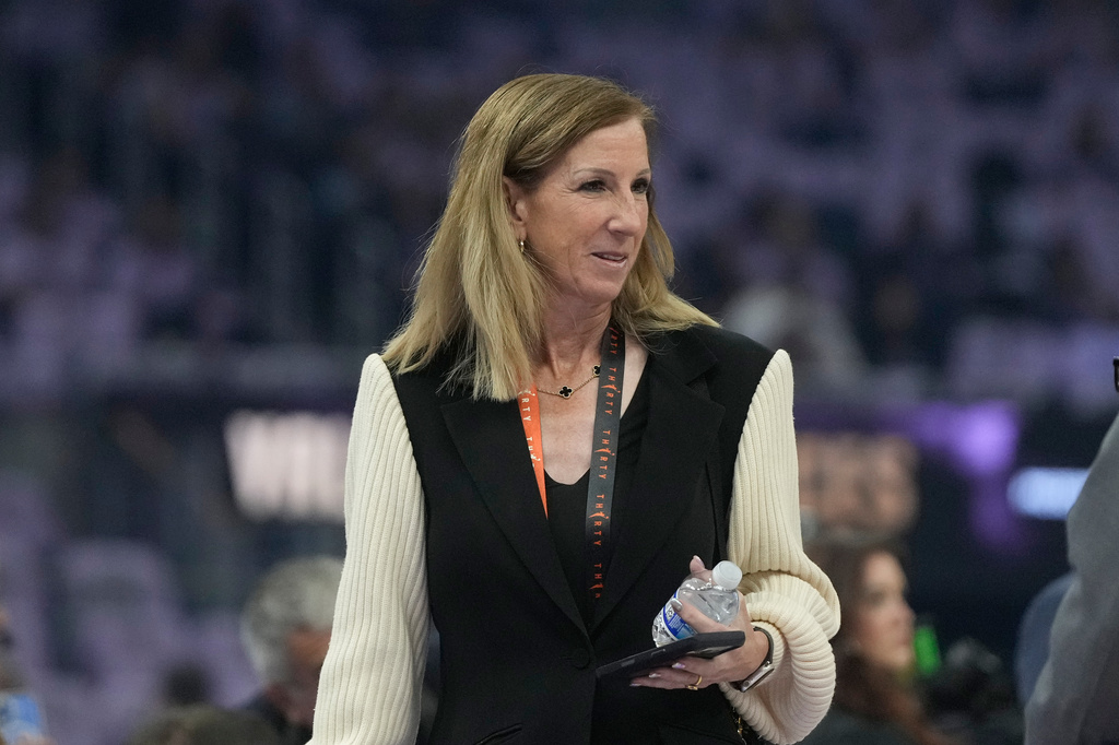 WNBA commissioner Cathy Engelbert walks on the court before Game 2 of the WNBA basketball semifinals between the Golden State Valkyries and the Las Vegas Aces, Wednesday, Oct. 7, 2026, in San Francisco. (AP Photo/Jeff Chiu)