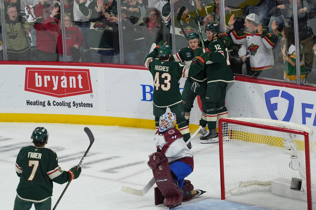 Minnesota Wild left wing Kirill Kaprizov (97) celebrates with teammates after scoring during the first period of Game 3 of an NHL Stanley Cup hockey second-round playoff series against the Colorado Avalanche, Saturday, May 9, 2026, in St. Paul, Minn. (AP Photo/Abbie Parr)