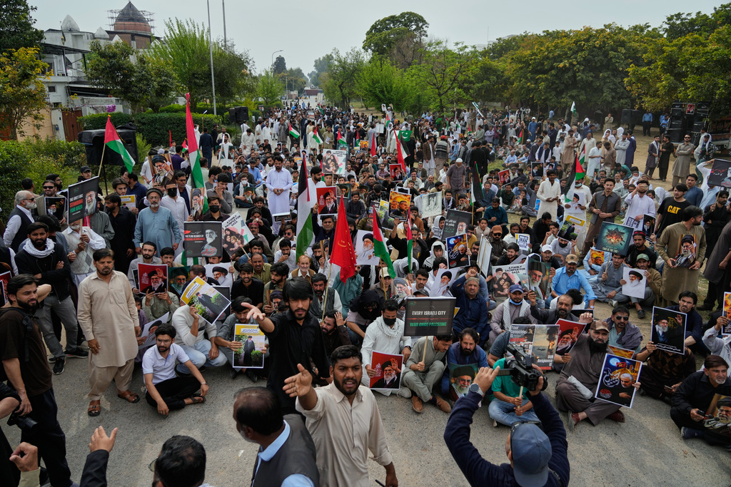 Shiite Muslims take part in a rally to condemn the killing of Iranian Supreme Leader Ayatollah Ali Khamenei and against the Israeli strikes on Iran, in Islamabad, Pakistan, Friday, March 6, 2026. (AP Photo/Anjum Naveed)