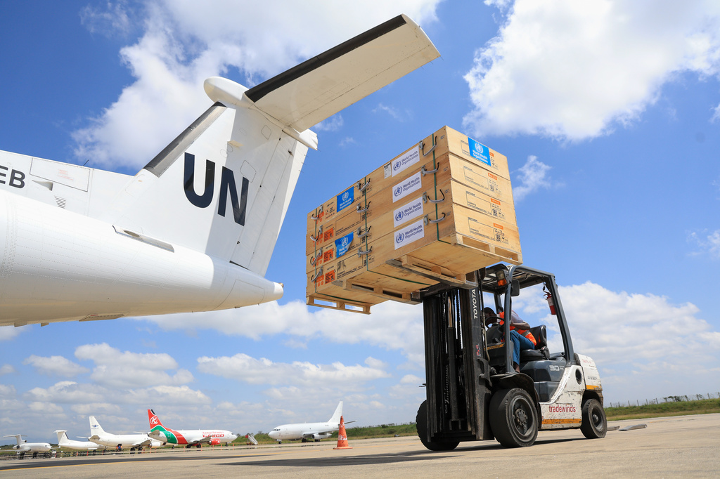 Workers load World Health Organization (WHO) emergency supplies onto a United Nations plane in Nairobi, Kenya, Wednesday, May 20, 2026, headed for Congo to combat the Ebola outbreak in Ituri province. (AP Photo/Andrew Kasuku)