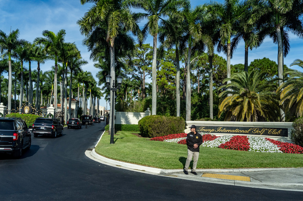 FILE - The motorcade for President Donald Trump arrives at Trump International Golf Club, Jan. 2, 2026, in West Palm Beach, Fla. (AP Photo/Alex Brandon, File)