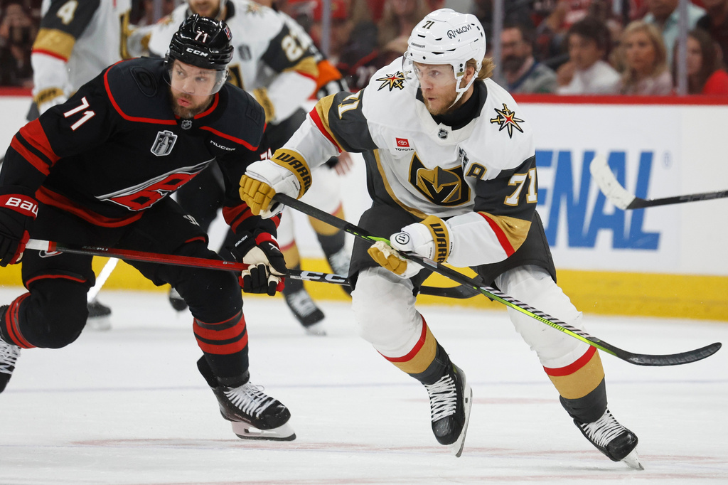 FILE - Vegas Golden Knights' William Karlsson (71) skates against Carolina Hurricanes' Taylor Hall (71) during the first period in Game 5 of the NHL hockey Stanley Cup Final series in Raleigh, N.C., June 11, 2026. (AP Photo/Karl DeBlaker)