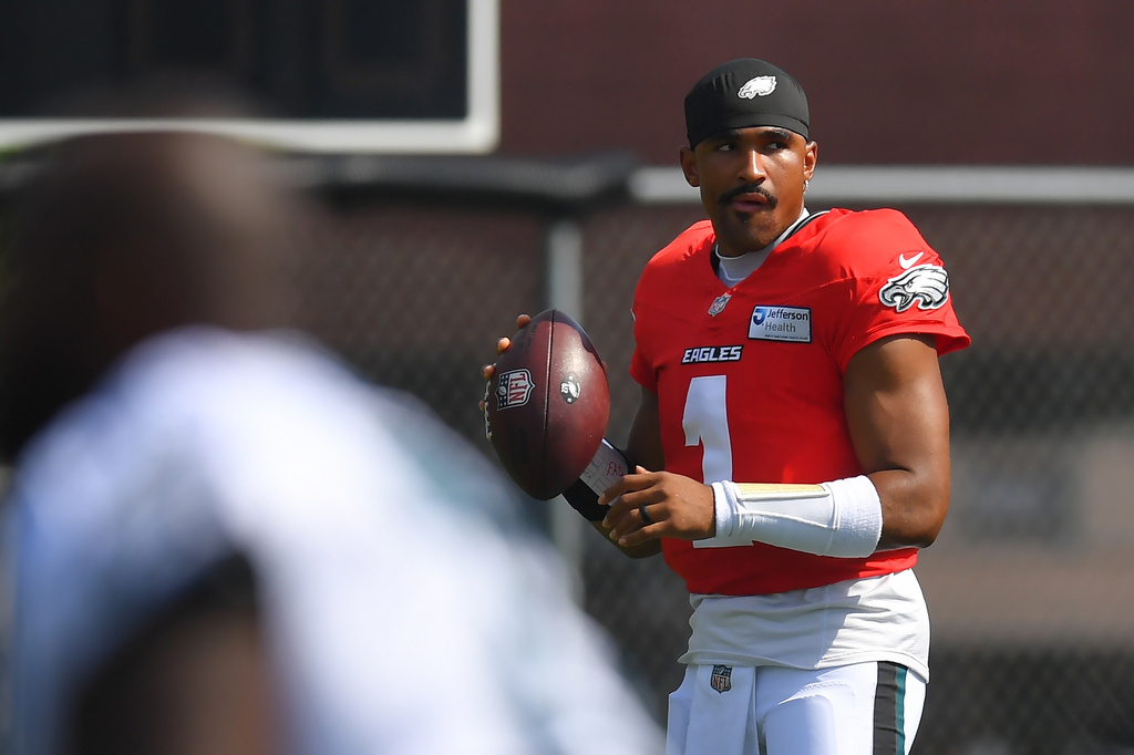 Philadelphia Eagles quarterback Jalen Hurts (1) looks to pass during a joint NFL football practice with the New England Patriots, Thursday, Aug. 20, 2026, in Foxborough, Mass. (AP Photo/Steven Senne)