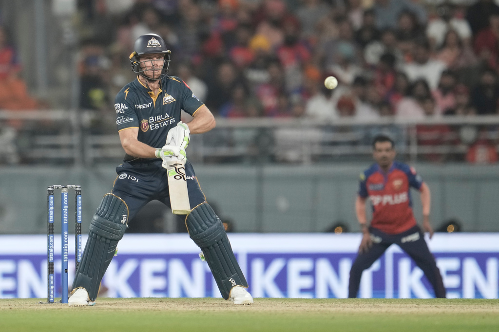 Gujarat Titans' Jos Buttler plays a shot during the Indian Premier League cricket match between Gujarat Titans and Punjab Kings in New Chandigarh, India, Tuesday, March 31, 2026. (AP Photo/Ashwini Bhatia)