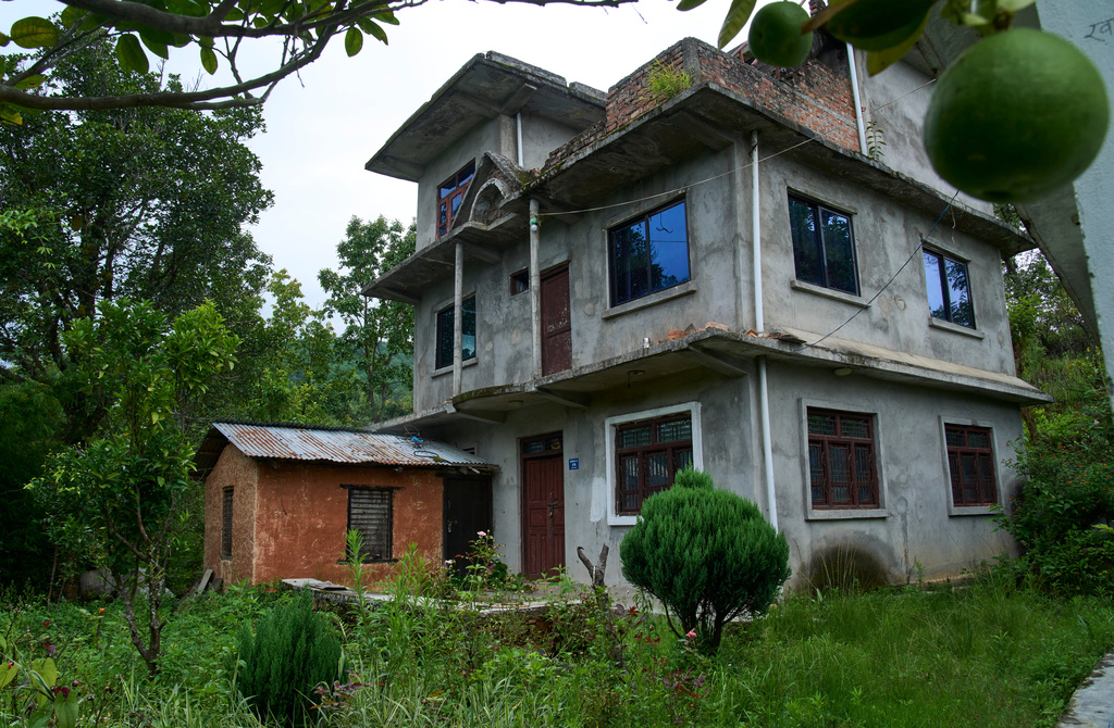 An abandoned house stands in Dharamghar, Dolakha district, about 86 kilometers (53 miles) east of Kathmandu, Nepal, Friday, July 24, 2026. (AP Photo/Niranjan Shrestha)