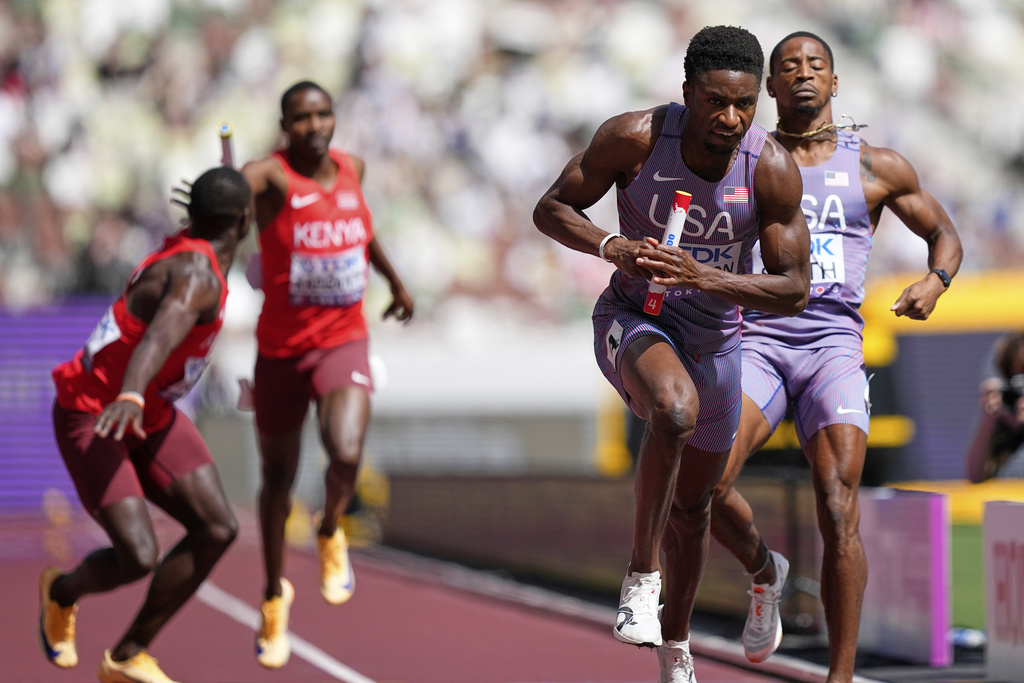 United States' Bryce Deadmon starts his leg in a run-off heat against Kenya in the men's 4x400 meters relay at the World Athletics Championships in Tokyo, Sunday, Sept. 21, 2025. (AP Photo/Petr David Josek)