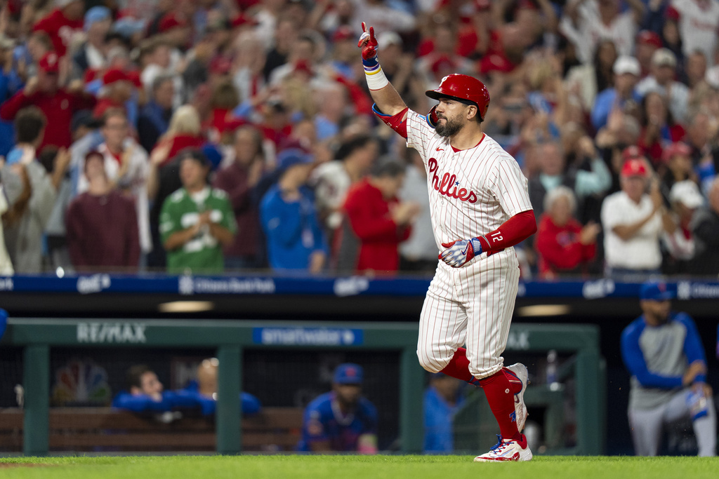 Philadelphia Phillies' Kyle Schwarber reacts to his three-run home run during the seventh inning of a baseball game against the New York Mets, Tuesday, Sep. 9, 2025, in Philadelphia. (AP Photo/Chris Szagola)