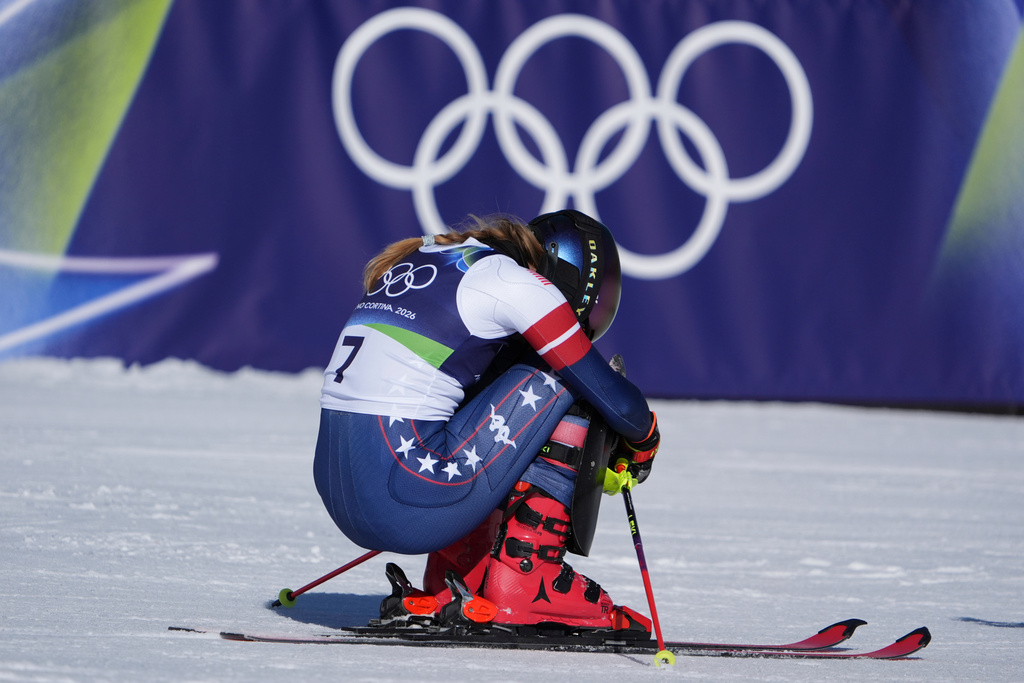 United States' Mikaela Shiffrin celebrates at the finish area of an alpine ski, women's slalom race, at the 2026 Winter Olympics, in Cortina d'Ampezzo, Italy, Wednesday, Feb. 18, 2026. (AP Photo/Jacquelyn Martin)