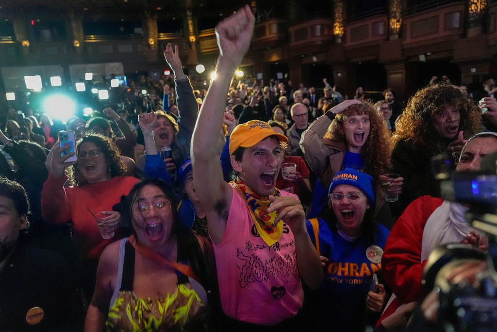 Supporters for Democratic mayoral candidate Zohran Mamdani react as they watch returns during an election night watch party, Tuesday, Nov. 4, 2025, in New York. (AP Photo/Yuki Iwamura)