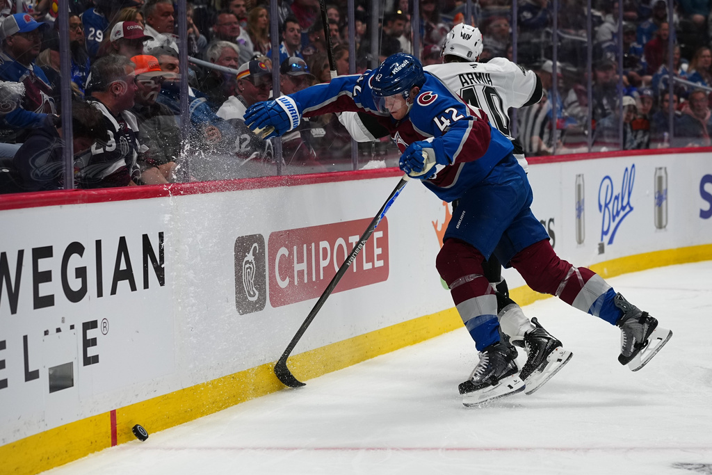 Colorado Avalanche defenseman Josh Manson (42) collides with Los Angeles Kings right wing Joel Armia (40) during the third period of Game 1 in the first round of the NHL hockey Stanley Cup playoffs, Sunday, April 19, 2026, in Denver. (AP Photo Jack Dempsey)