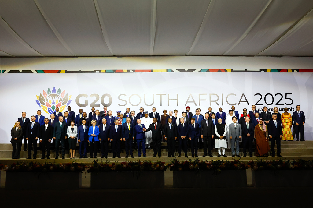 Leaders and delegates pose for a group photo, on the opening day of the G20 Leaders' Summit, in Johannesburg, South Africa, Saturday, Nov. 22, 2025. (Thomas Mukoya/Pool Photo via AP)