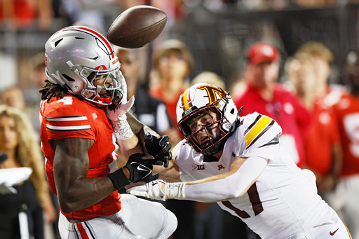 Minnesota defensive back John Nestor, right, deflects a pass intended for Ohio State receiver Jeremiah Smith during the first half of an NCAA college football game Saturday, Oct. 4, 2025, in Columbus, Ohio. (AP Photo/Jay LaPrete) Minnesota defensive back John Nestor, right, deflects a pass intended for Ohio State receiver Jeremiah Smith during the first half of an NCAA college football game Saturday, Oct. 4, 2025, in Columbus, Ohio. (AP Photo/Jay LaPrete)