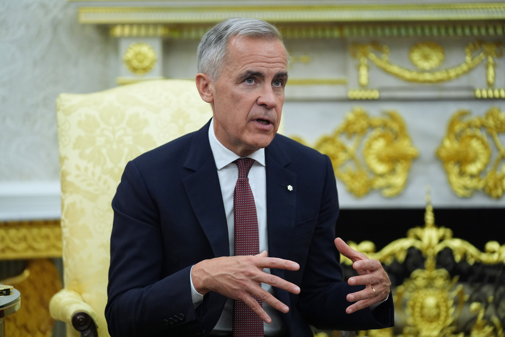 Canadian Prime Minister Mark Carney speaks during a meeting with President Donald Trump at the White House, Tuesday, Oct. 7, 2025, in Washington. (AP Photo/Evan Vucci) Washington. (AP Photo/Evan Vucci)