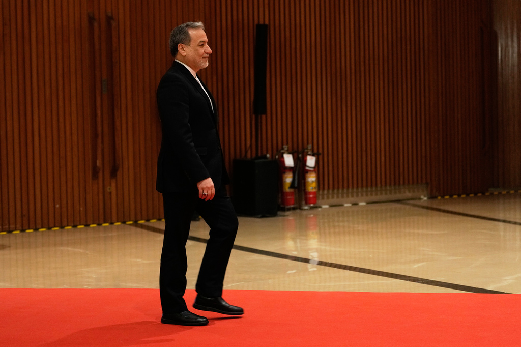 Iranian Foreign Minister Abbas Araghchi arrives for a two-day BRICS nations Foreign Ministers meeting in New Delhi, India, Thursday, May 14, 2026. (AP Photo/Manish Swarup)