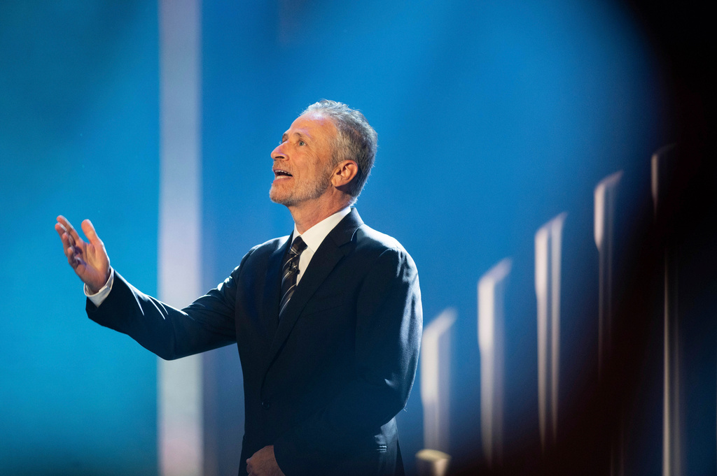 FILE - Mark Twain Prize recipient Jon Stewart is introduced at the start of the 23rd annual Mark Twain Prize for American Humor at the Kennedy Center for the Performing Arts, in Washington, April 24, 2022. (AP Photo/Kevin Wolf, File)