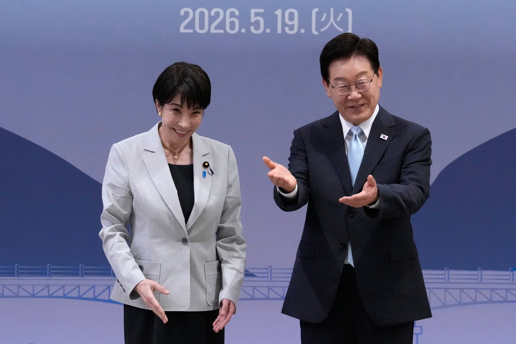 Japan's Prime Minister Sanae Takaichi, left, and South Kore's President Lee Jae Myung react during their meeting in Andong, South Korea, Tuesday, May 19, 2026. (AP Photo/Ahn Young-joon, Pool)