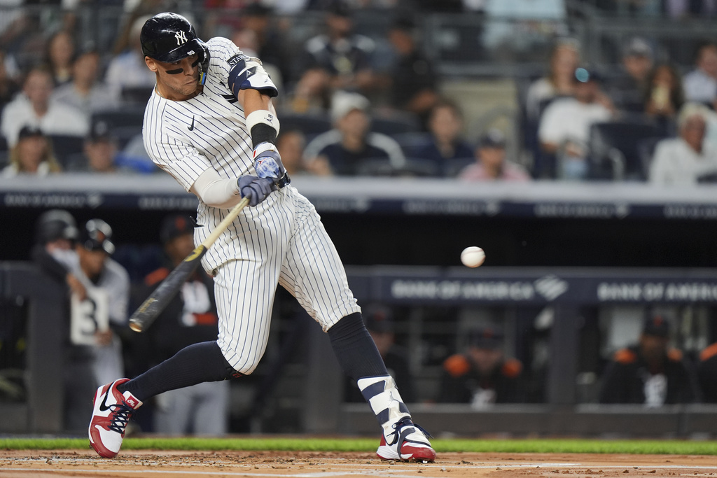 New York Yankees' Aaron Judge hits a home run during the first inning of a baseball game against the Detroit Tigers Thursday, Sept. 11, 2025, in New York. (AP Photo/Frank Franklin II)