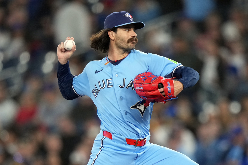 Toronto Blue Jays pitcher Dylan Cease (84) throws during the first inning of a baseball game Los Angeles Dodgers in Toronto, Wednesday, April 8, 2026. (Nathan Denette/The Canadian Press via AP)